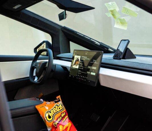 Best Electric Cars of 2025: Which One Fits Your Lifestyle? Messy Cybertruck interior: spilled Flamin’ Hot Cheetos, cracked phone streaming lo-fi, sticky notes.