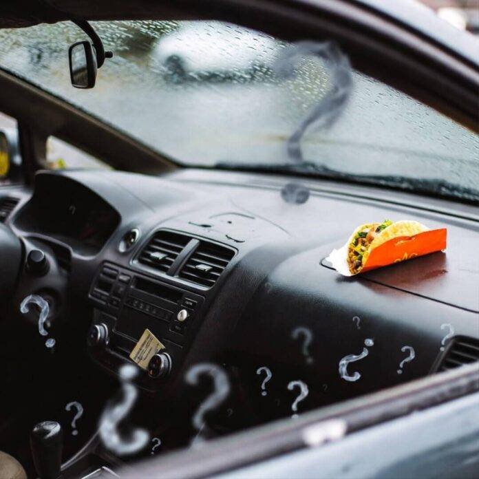Rainy car interior with taco wrapper, insurance card, and smoky question marks. Rainy car interior with taco wrapper, insurance card, and smoky question marks.