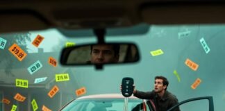 Buying a New Car? Avoid These 7 Common Mistakes Bewildered driver holds giant key fob beside burrito-smeared red car with floating price tags.