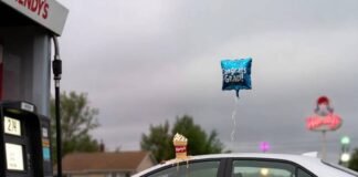 Fuel-Efficient Sedans That Won’t Break the Bank Dented Corolla with melting Frosty, deflated balloon, flip-flop under tire at E85 pump.