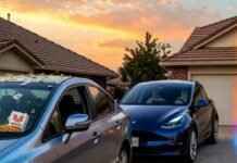Why Used Cars Are a Smarter Investment Than Ever Dusty old Honda Civic parked crookedly beside shiny new Tesla Model Y in sunset driveway, fries spilling, burning dollar confetti floating.