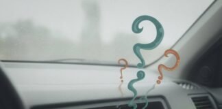 Hidden Car Insurance Coverage You Might Be Missing Crumpled insurance in messy car glovebox.